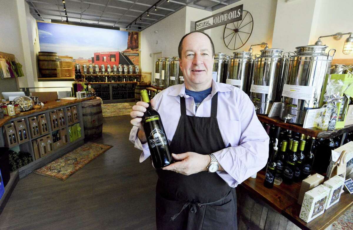 Rick Doyle, owner of Stagecoach Olive Oil & Vinegar Co., is photographed on Wednesday, Jan. 24, 2018 at its store at 180 Bedford St., in downtown Stamford, Conn.