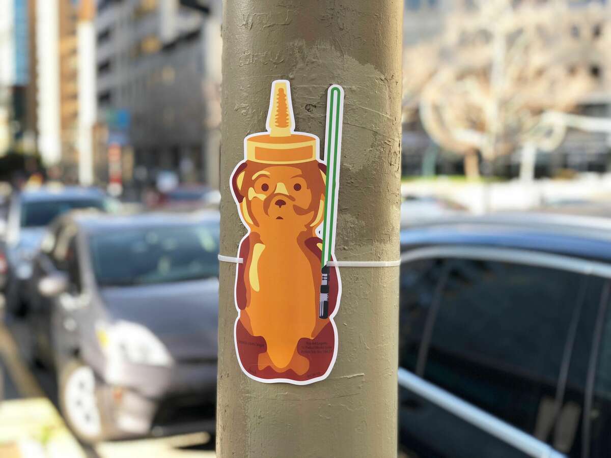 Photos show examples of the different honey bears street artist fnnch plastered around downtown San Francisco overnight Sunday.