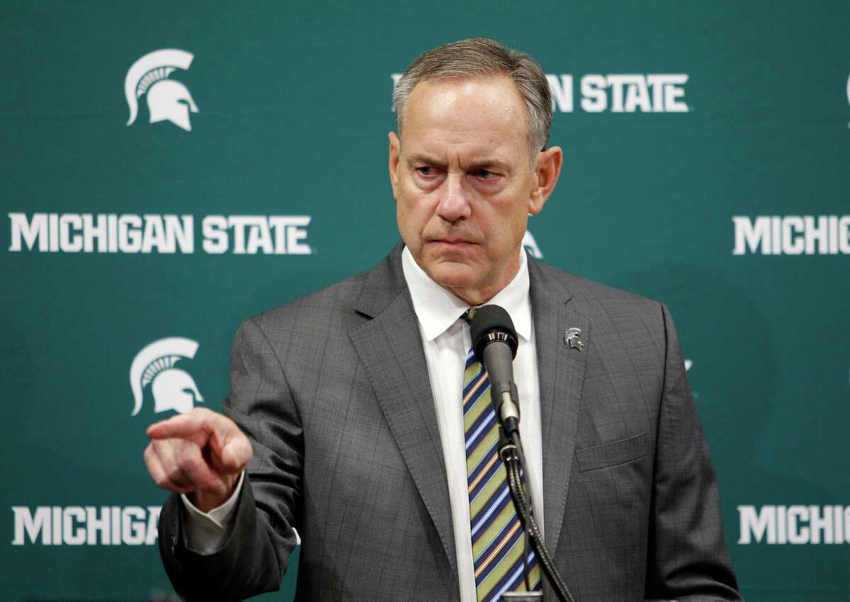 Michigan State football coach Mark Dantonio addresses the media about the school's handling of sexual abuse allegations, before an NCAA college basketball game between Michigan State and Wisconsin, Friday, Jan. 26, 2018, in East Lansing, Mich. (AP Photo/Al Goldis)