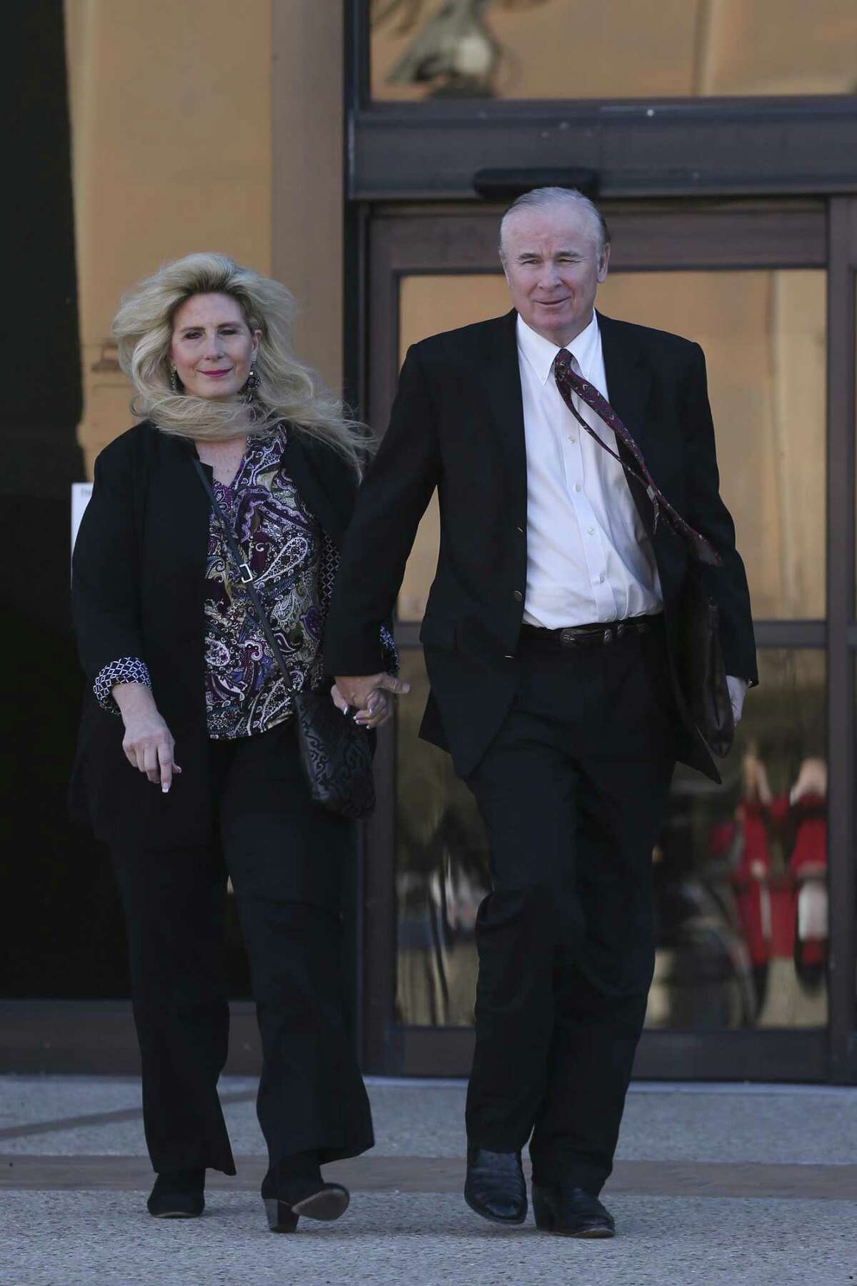 Prosecution witnesses Richard and Sharlene Thum leave the John H. Woods Jr. U.S. Courthouse during a Monday lunch break in the criminal fraud trial of state Sen. Carlos Uresti and his co-defendant, Gary Cain. The Thums had invested with FourWinds Logistics, a bankrupt frac-sand company accused defrauding investors.