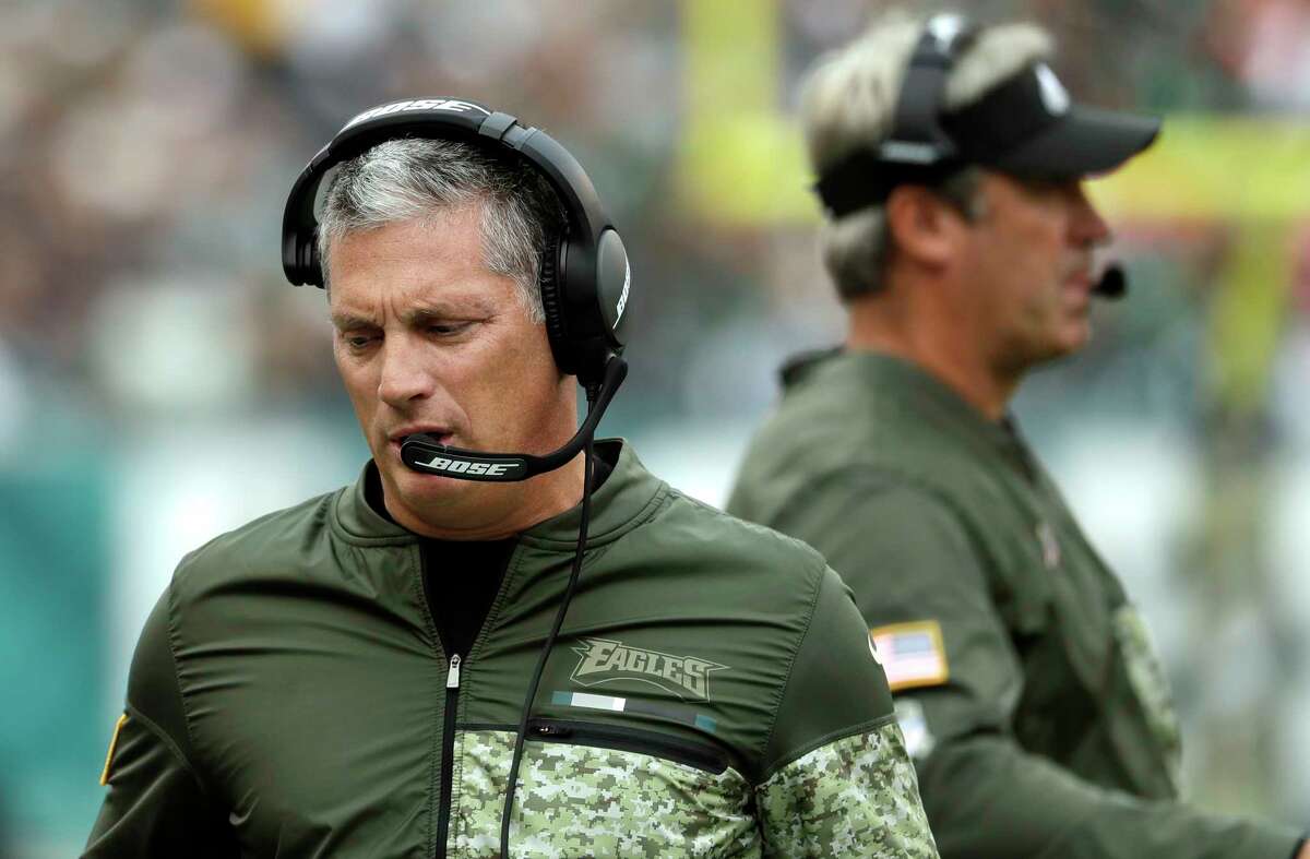 FILE - In this Nov. 5, 2017, file photo, Philadelphia Eagles' Jim Schwartz watches from the sideline during the first half of an NFL football game against the Denver Broncos in Philadelphia. Schwartz doesn't appear to be getting a head coaching job but perhaps deserves one after the way he's rebuilt an awful defense in two years. The Eagles ranked among the bottom three for three straight years under Chip Kelly and rose to the top five under Schwartz.(AP Photo/Michael Perez, File)