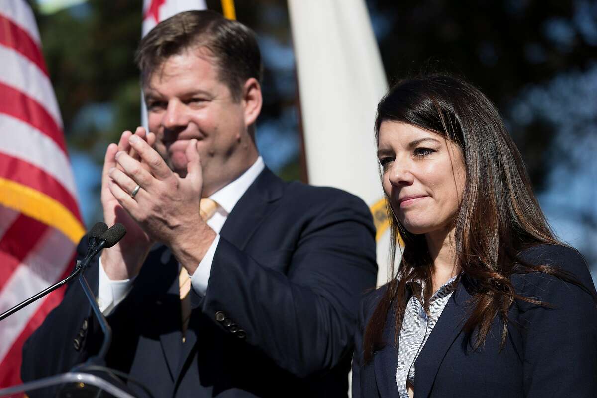 From left: Interim Mayor Mark Farrell and newly appointed supervisor Catherine Stefani answer questions from the public at the Marina Branch Library Plaza, Tuesday, Jan. 30, 2018, in San Francisco, Calif. Stefani was sworn in as District 2 supervisor, replacing interim mayor Farrell.