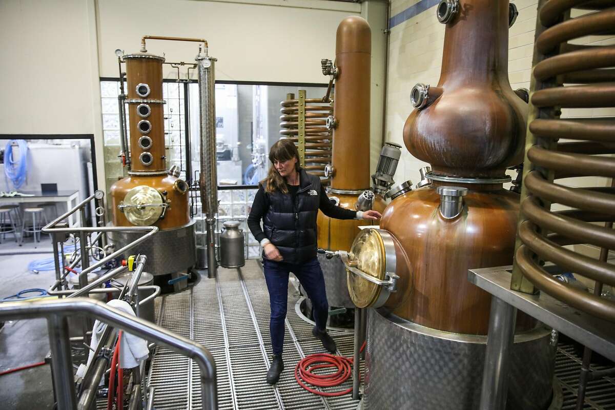 Lead distiller Kendra Scott works in the production area at Anchor Distilling in San Francisco, California, on Monday, Jan. 29, 2018.