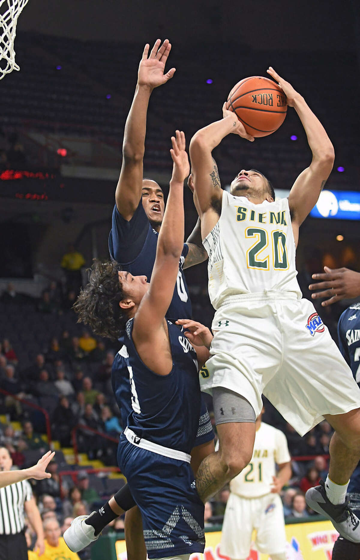 Siena's Roman Penn, who had 18 points against Saint Peter's, is in charge of a Siena offense that's been slow-paced. (Lori Van Buren/Times Union)