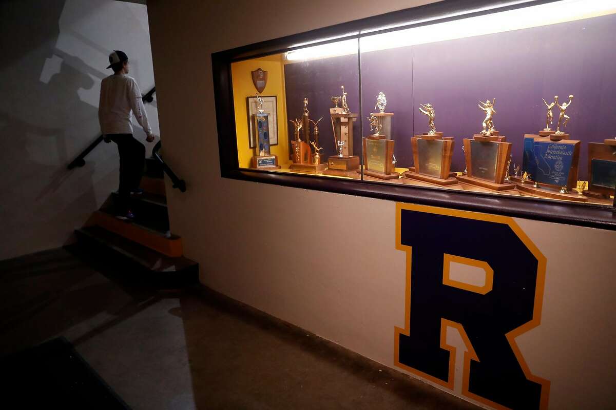 Archbishop Riordan High School’s gymnasium trophy case is shown. Riordan has clearance to reopen for in-person learning.