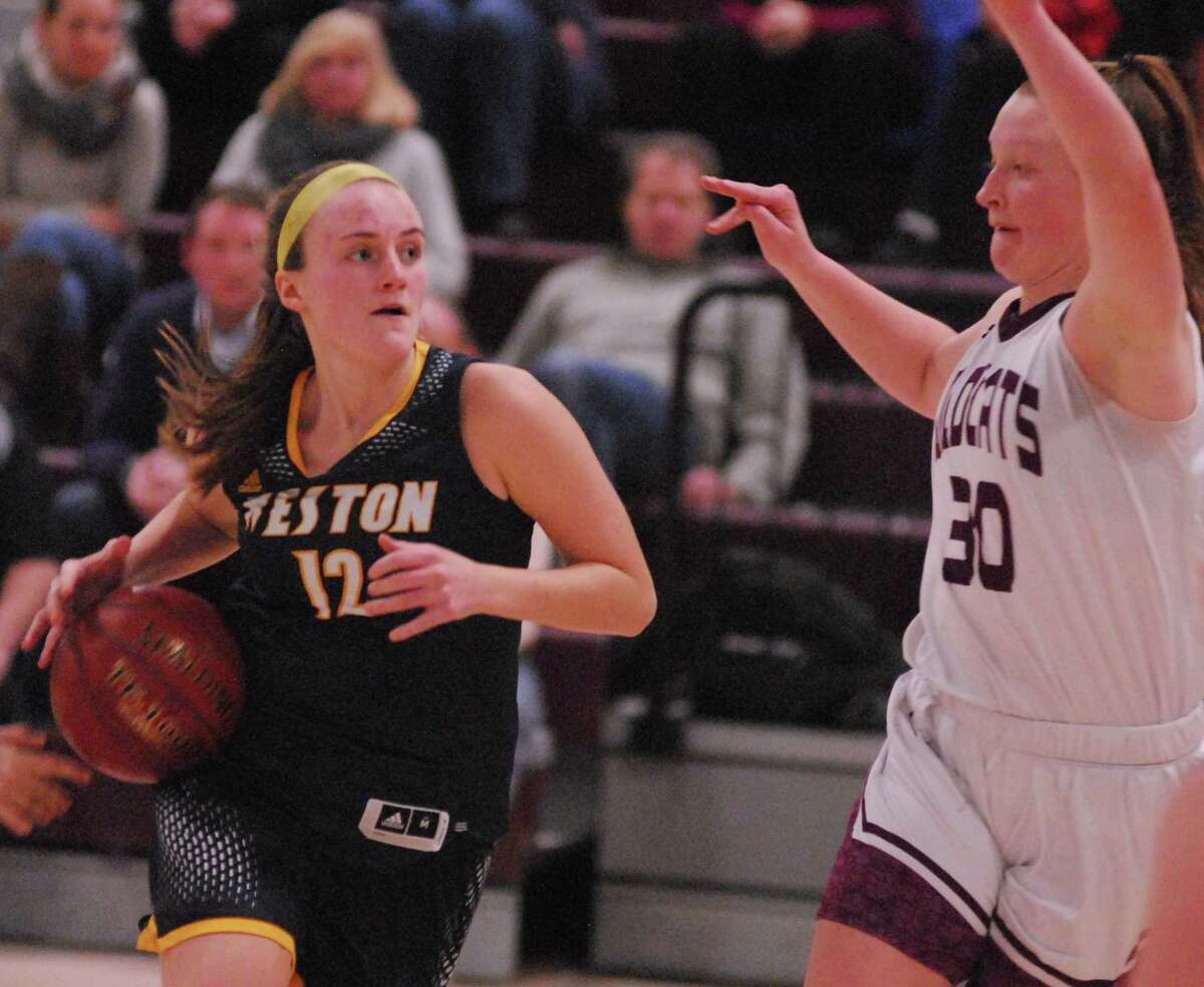 Weston’s Grace Toner drives to the basket during Tuesday’s game against Bethel.