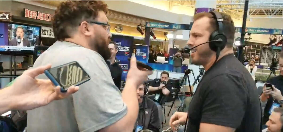 Rival Houston sports talk radio hosts Seth Payne (right) and Josh Innes (left) argue live on the air from Super Bowl's Radio Row on Wednesday, Jan. 31, 2018.