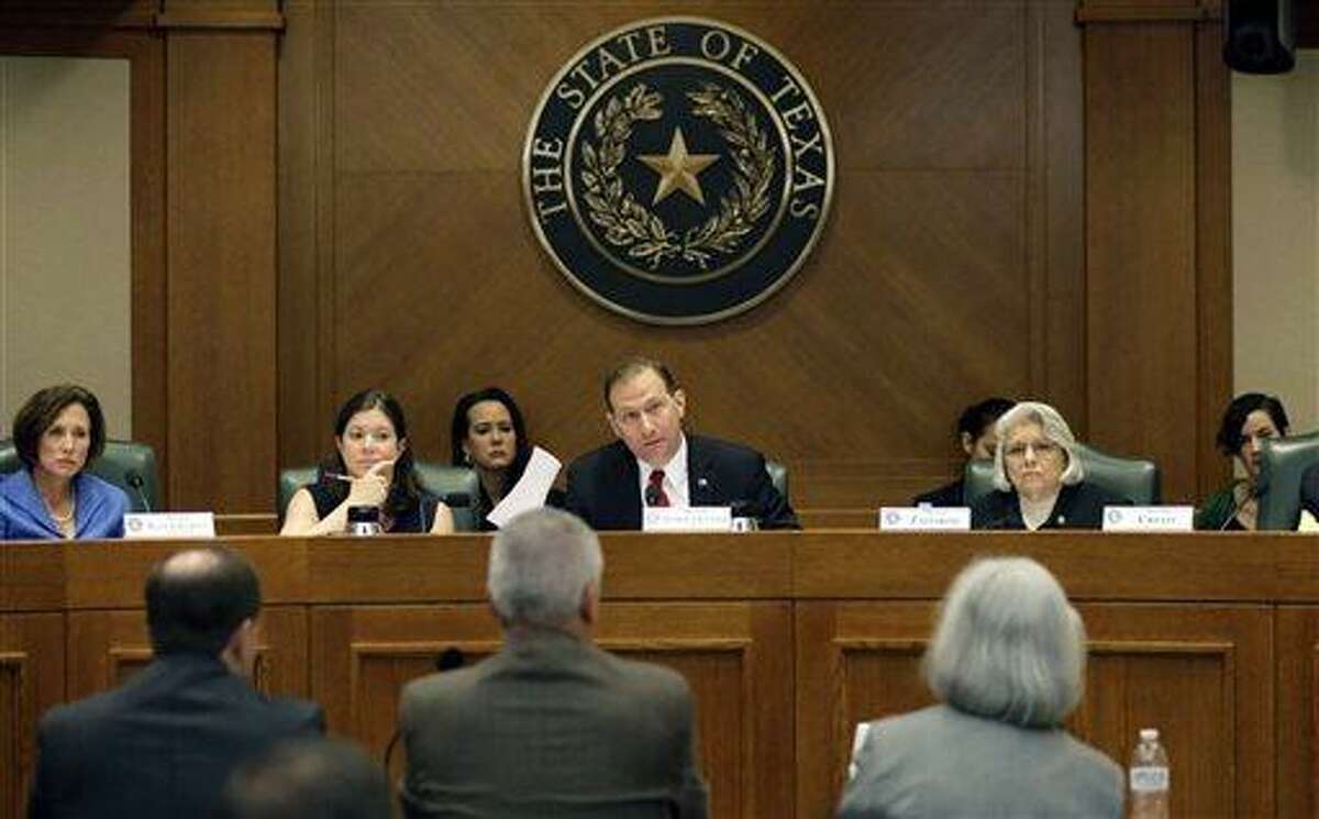 Sen. Charles Schwertner, R-Georgetown, center, questions witnesses during a Texas Senate Health and Human Services Committee hearing in July 2015. Schwertner, chair of the committee, said Wednesday that he is asking for more information from the state’s Health and Human Services Commission after a recent audit showed the agency inappropriately allowed a health benefits contractor to pay millions of dollars in bonuses and incentives.