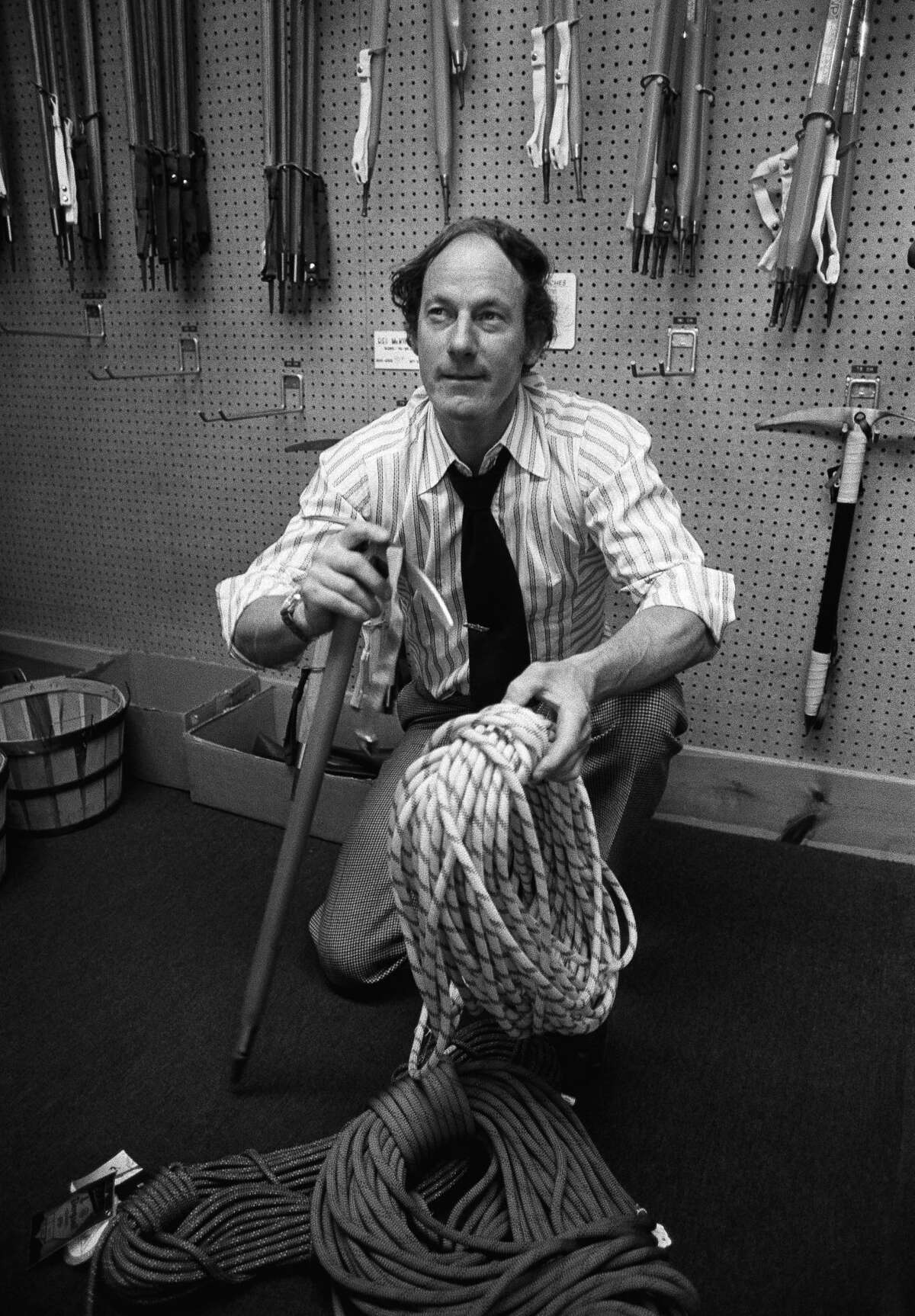 Jim Whittaker, shown here April 12, 1975 in Seattle, shows off some of the gear he will be taking when he leads a nine-member American expedition to climb K2, a 28,741 feet high mountain on the China-Pakistan border. Big Jim was first American atop Mt. Everest, and early CEO of Recreational Equipment, Inc. A second expedition, in 1978, reached summit of K2.