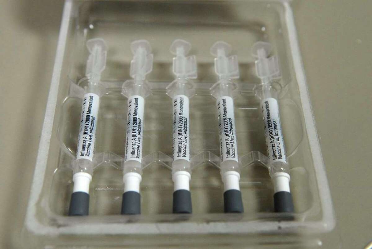 Doses of the H1N1 flu nasal vaccine await use.