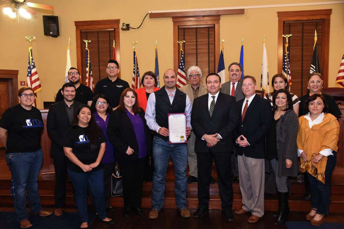 A group photo with the proclamation is taken at Laredo's Commissioners Court, Wednesday, January 31, 2018.