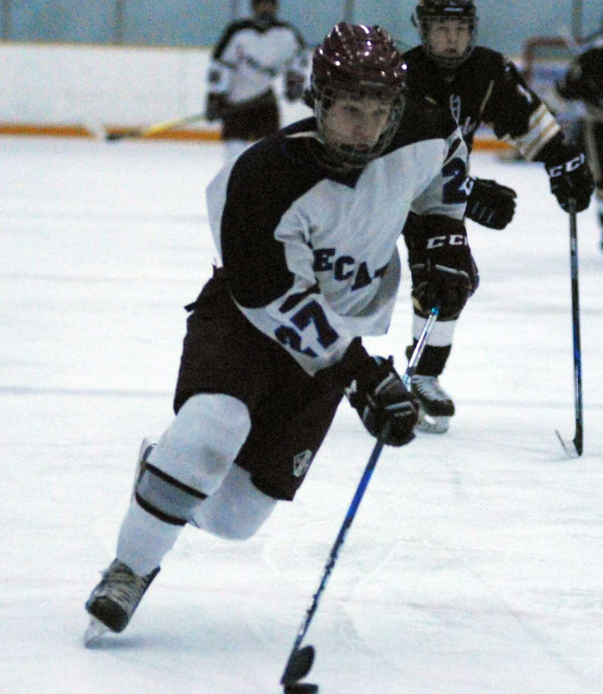 BBD sophomore Tyler Caldara skates with the puck during a game against Barlow on Wednesday.