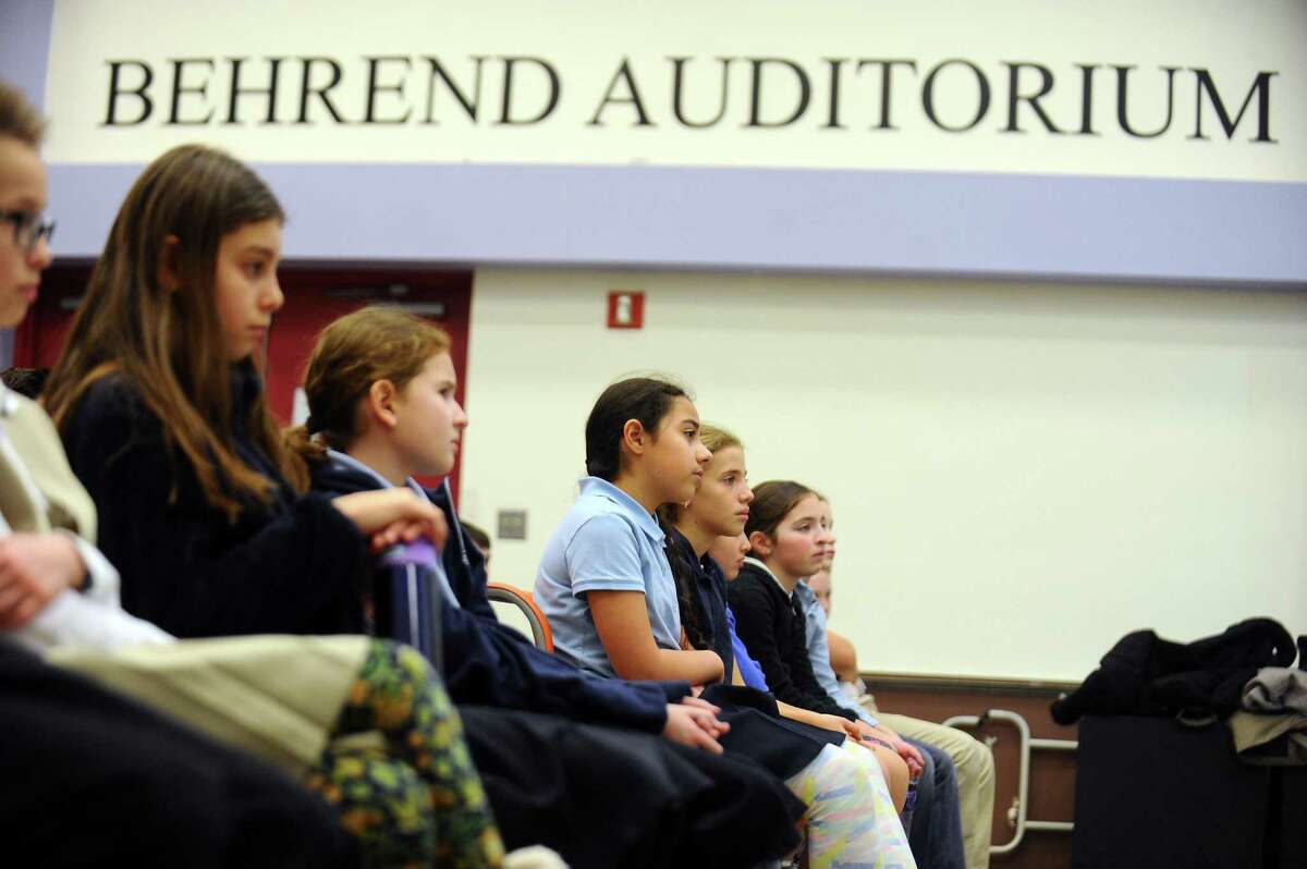 Bi Cultural Day School students listen to a presentation given by non-profit group myFace about kids with facial differences, and how to prioritize kindness over bullying, inside the Behrend Auditorium in Stamford, Conn. on Wednesday, Jan. 31, 2018. MyFace is a non-profit organization dedicated to transforming the lives of patients with craniofacial conditions while also educating the public about these facial differences like Treacher Collins syndrome, which was recently highlighted in the movie "Wonder."