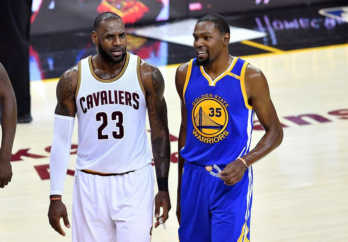 Kevin Durant and James Harden of Team LeBron walk the tunnel prior