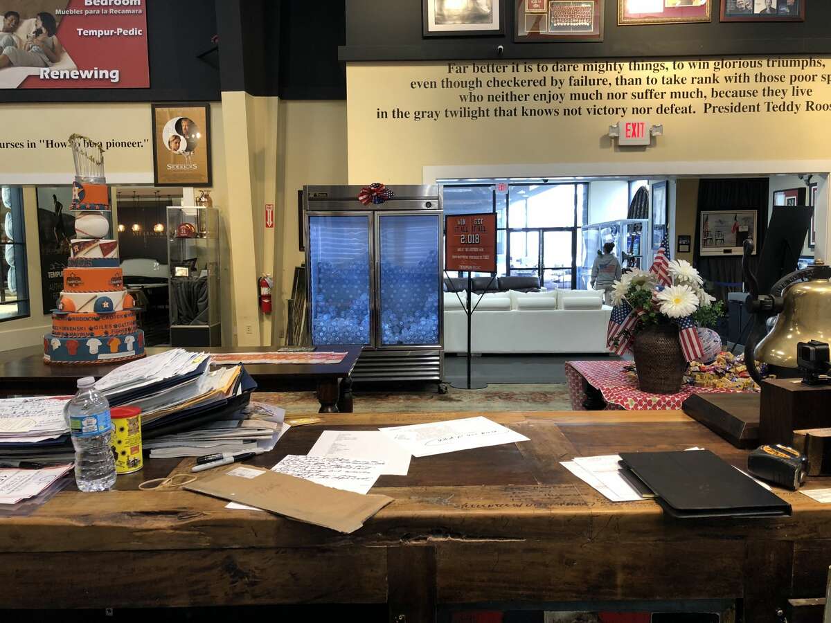 FROM THE DESK OF...: Mattress Mack's station at Gallery Furniture This is Mack's view from his desk at the Gallery Furniture store off the North Freeway in Houston. He's the first thing customers see when they come inside. See more photos of Mattress Mack's desktop counter.... 