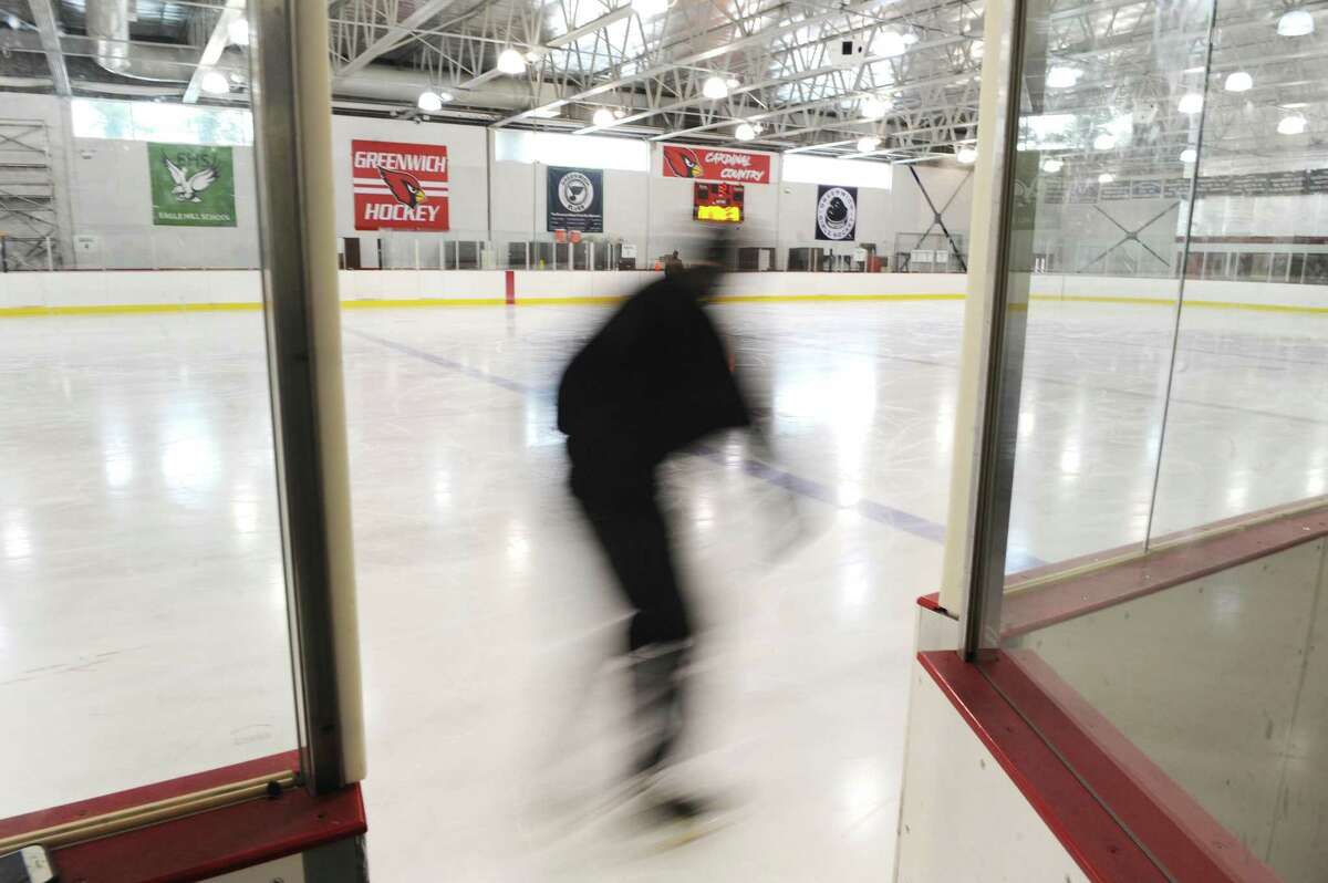 A man skates during open ice time at Dorothy Hamill Skating Rink in Greenwich, Conn. Thursday, Feb. 1, 2018. The rink and buidling are in poor condition and the town is considering funding renovations to update and improve the rink.