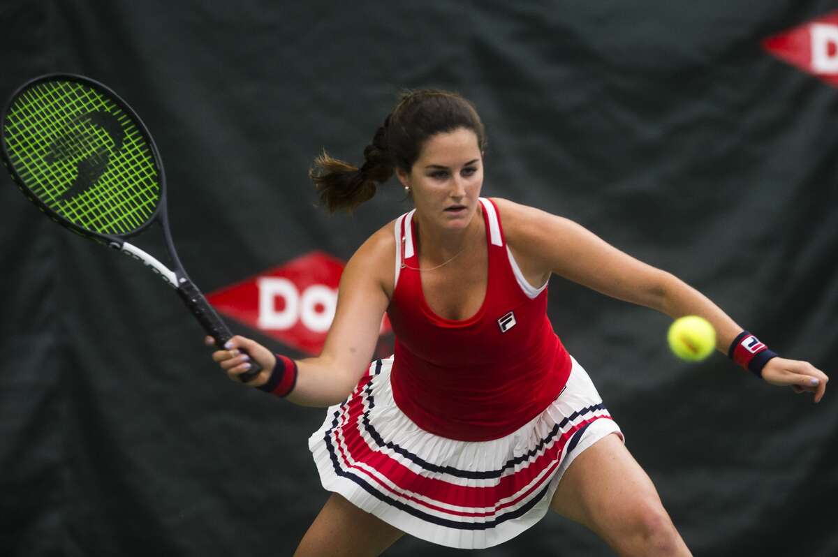 Jamie Loeb of New York returns the ball during her match against Sofia Kenin of Florida during the Dow Tennis Classic on Thursday, Feb. 1, 2018 at the Greater Midland Tennis Center. (Katy Kildee/kkildee@mdn.net)