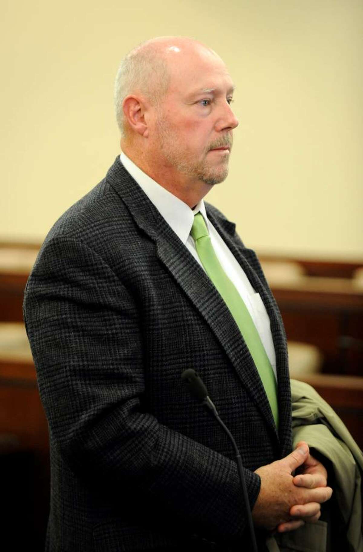 Albany Police Detective George McNally lost his driver's license and was ordered to pay $4,500 in damages when he was sentenced today by Judge Stephen Herrick in Albany County Court. (Skip Dickstein / Times Union)