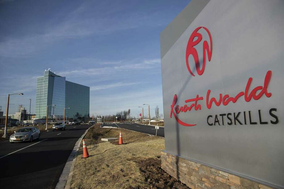 Traffic moves past a sign for the Resorts World Catskills casino, hotel and entertainment complex, operated by Empire Resorts Inc. in Monticello, New York, U.S., on Friday, Jan. 26, 2018. Empire Resorts, controlled by Lim Kok Thay, chairman of Genting Bhd., on Feb. 8 will open Resorts World Catskills, a $1.2 billion casino, hotel and entertainment complex at the site of the old Concord Resort Hotel, the largest of the upstate New York resorts that helped launch the careers of Rodney Dangerfield, Jerry Lewis, Sid Caesar, Joan Rivers and other Jewish comedians. Photographer: Victor J. Blue/Bloomberg Photo: Victor J. Blue, Bloomberg News Service / © 2018 Bloomberg Finance LP