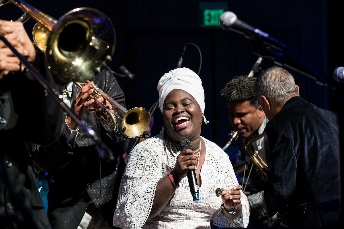 Daym� Arocena (center) sings alongside all the other performers from the evening during a last song during the performance portion of the SFJAZZ Gala 2018 at SFJAZZ Center in San Francisco, Calif., on Thursday, February 1, 2018. The evening honored New Orleans jazz organization and band Preservation Hall, which was presented with the SFJAZZ Lifetime Achievement Award.