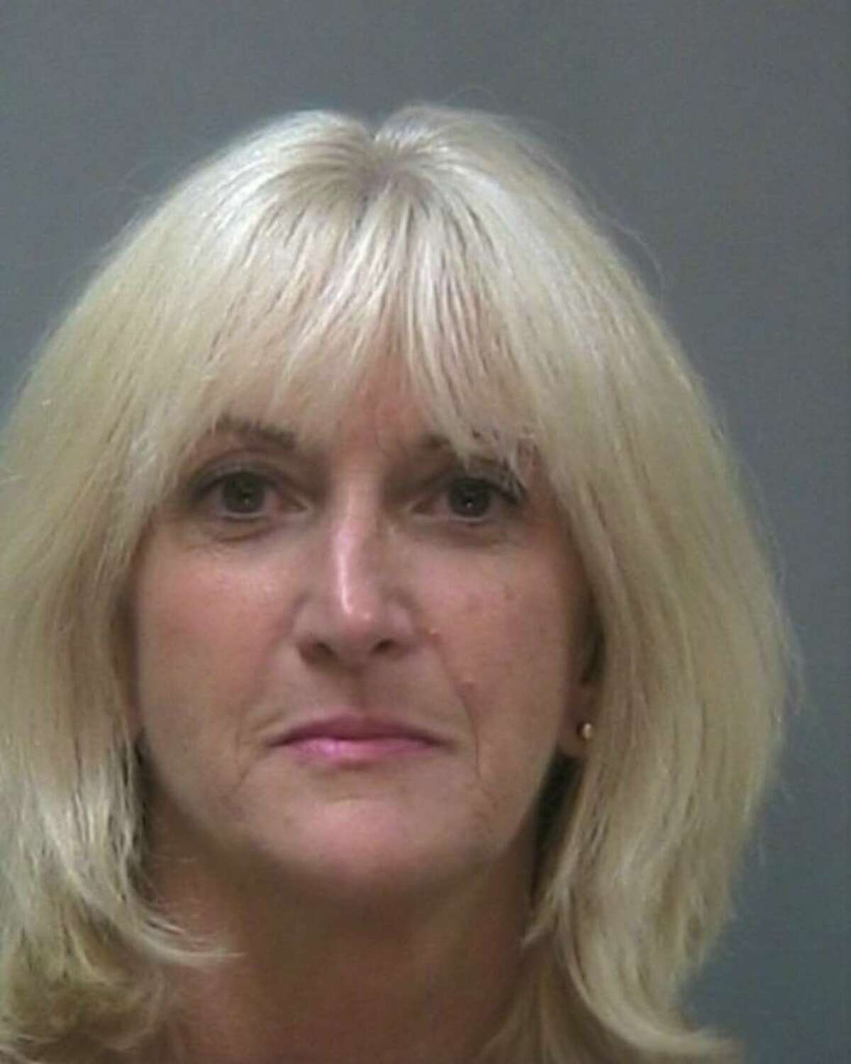 Jacqueline Hankle, a 39-year state employee, is suspended without pay from her Division of Criminal Justice Services job after she was accused of felony computer trespass charges for improperly using her state computer. (State Police)