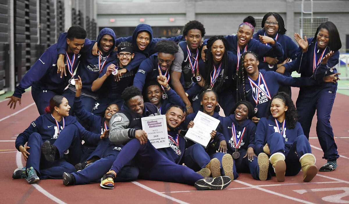 Hillhouse celebrates their win at the SCC track and field championships, Feb. 2, 2018, at Floyd Little Athletic Center in New Haven.
