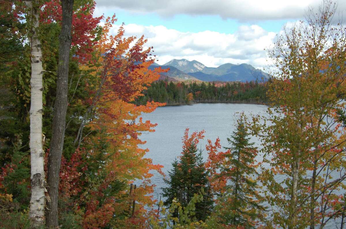 The Adirondack Mountains and other high spots around upstate New York could get a coating of ice by Wednesday morning. The High Peaks region of the Adirondack mountains towers above Boreas Pond. Sept. 23, 2012, in North Hudson, N.Y. (File)