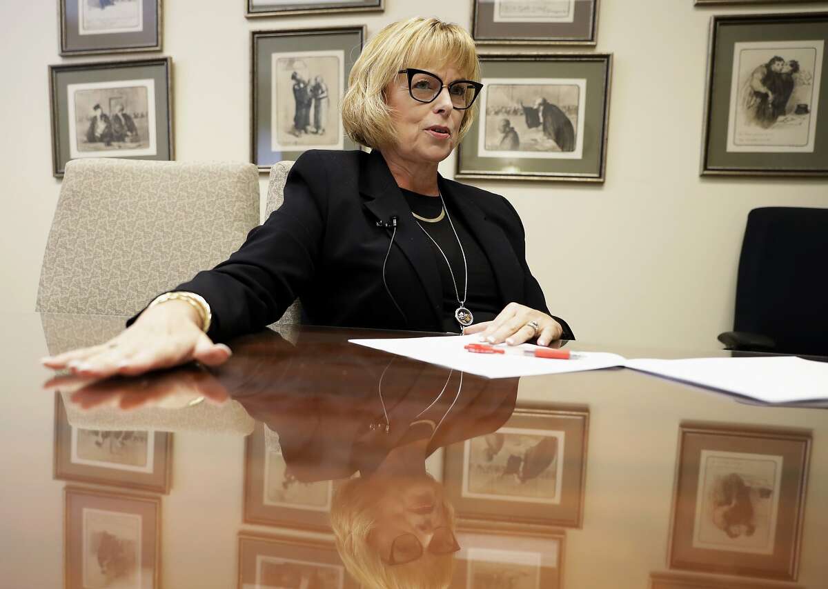 FILE - In this Sept. 18, 2017, file photo, juvenile Judge Marilyn Moores speaks during an interview in Indianapolis. Newly released federal figures show a sharp rise in child abuse fatalities in the U.S., with the bulk of the increase occurring in two states, Indiana and Texas, where child-welfare agencies have been in disarray. Moores says her Indianapolis courtroom has seen a surge in child welfare cases due to the opioid epidemic. (AP Photo/Darron Cummings, File)