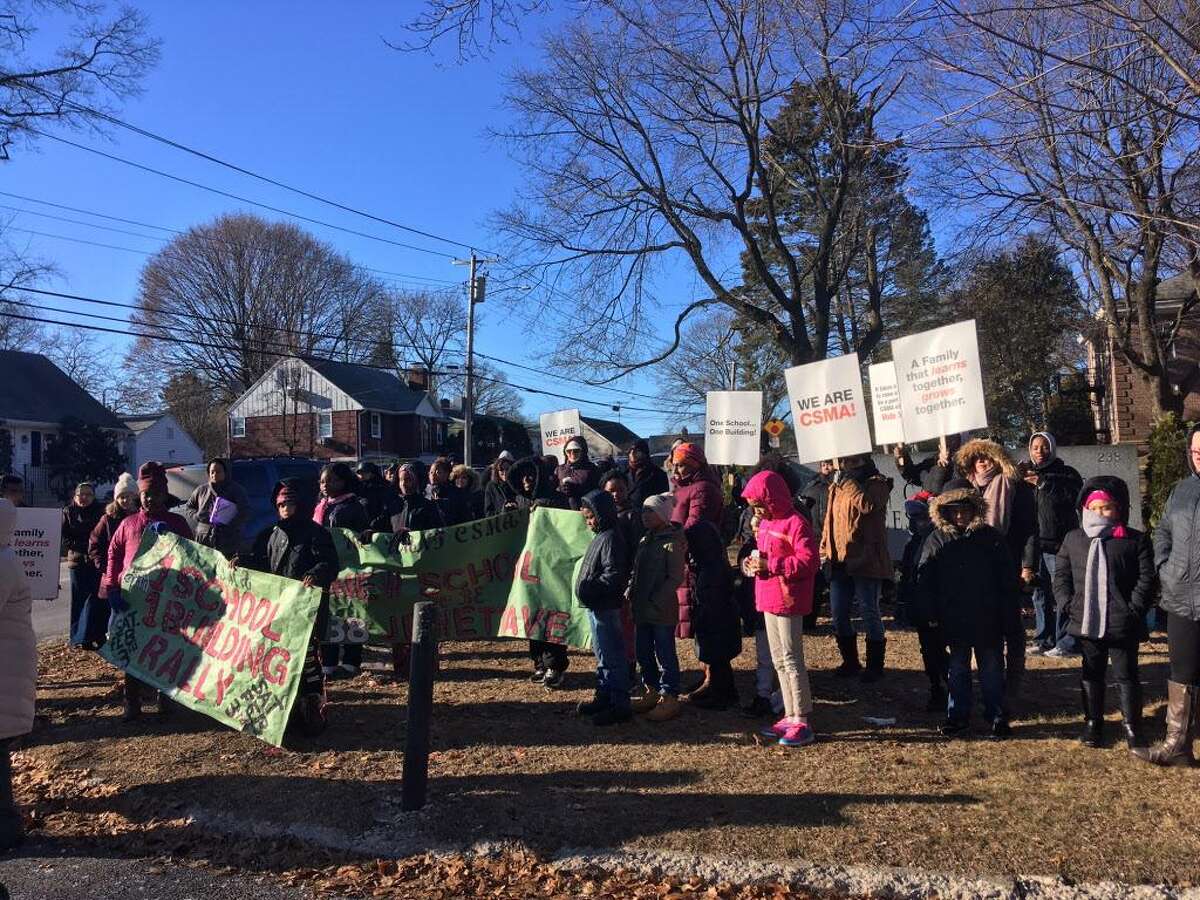 Classical Studies rally for a single building