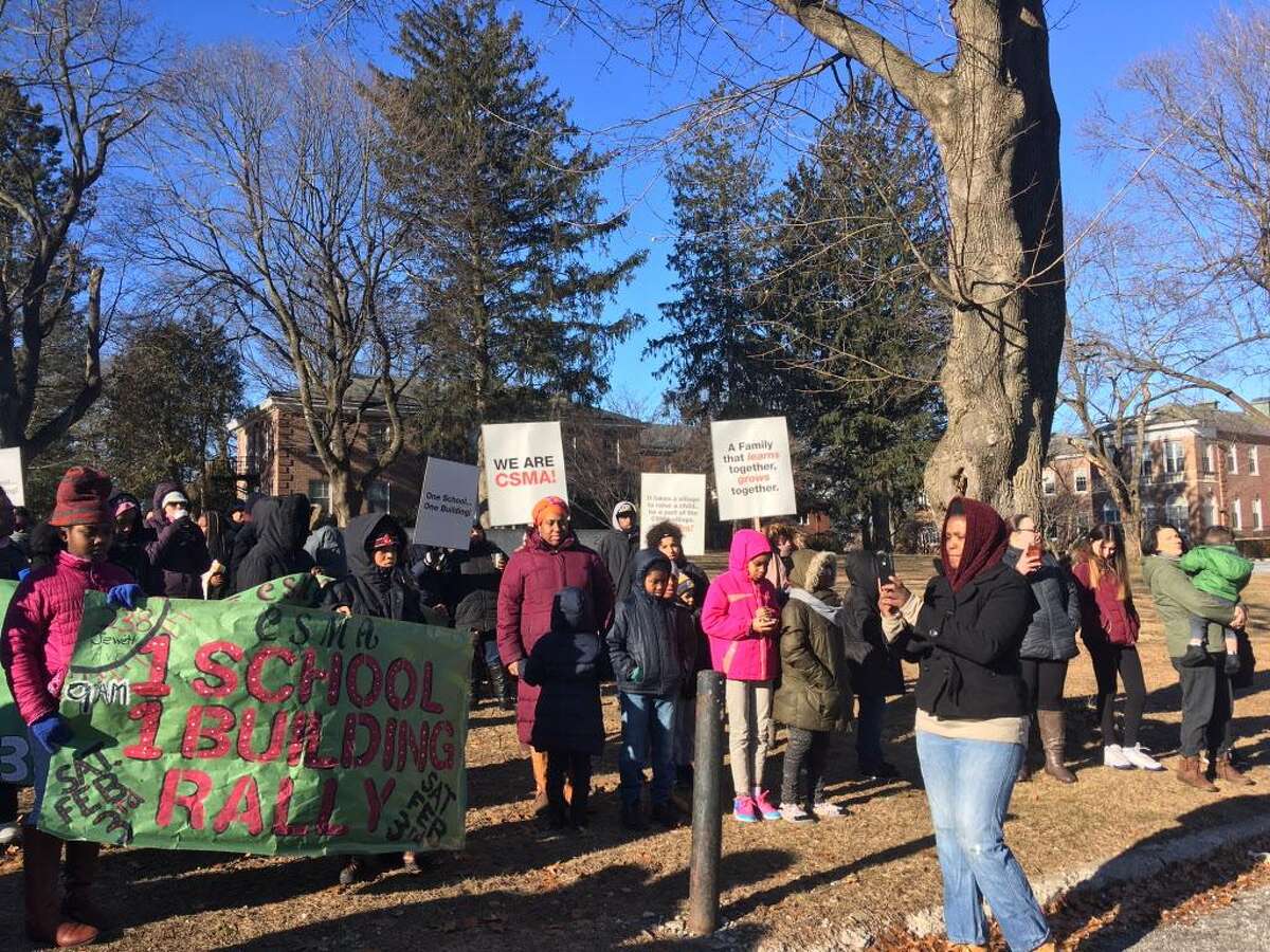 Classical Studies rally for a single building