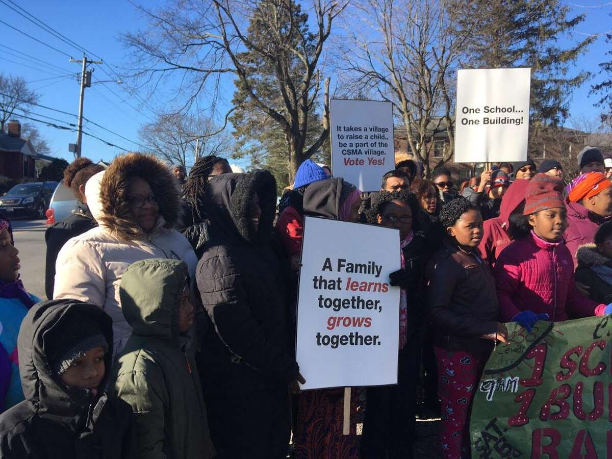 Classical Studies rally for a single building