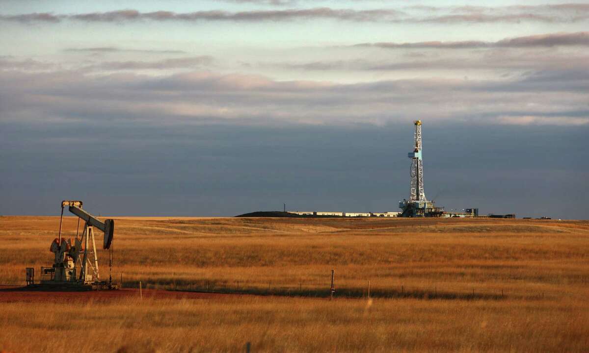 This oil drilling rig is near Watford City, N.D. Bakken output is set to exceed the December 2014 record of 1.23 million barrels a day in the first half of 2018, a state official says. ﻿