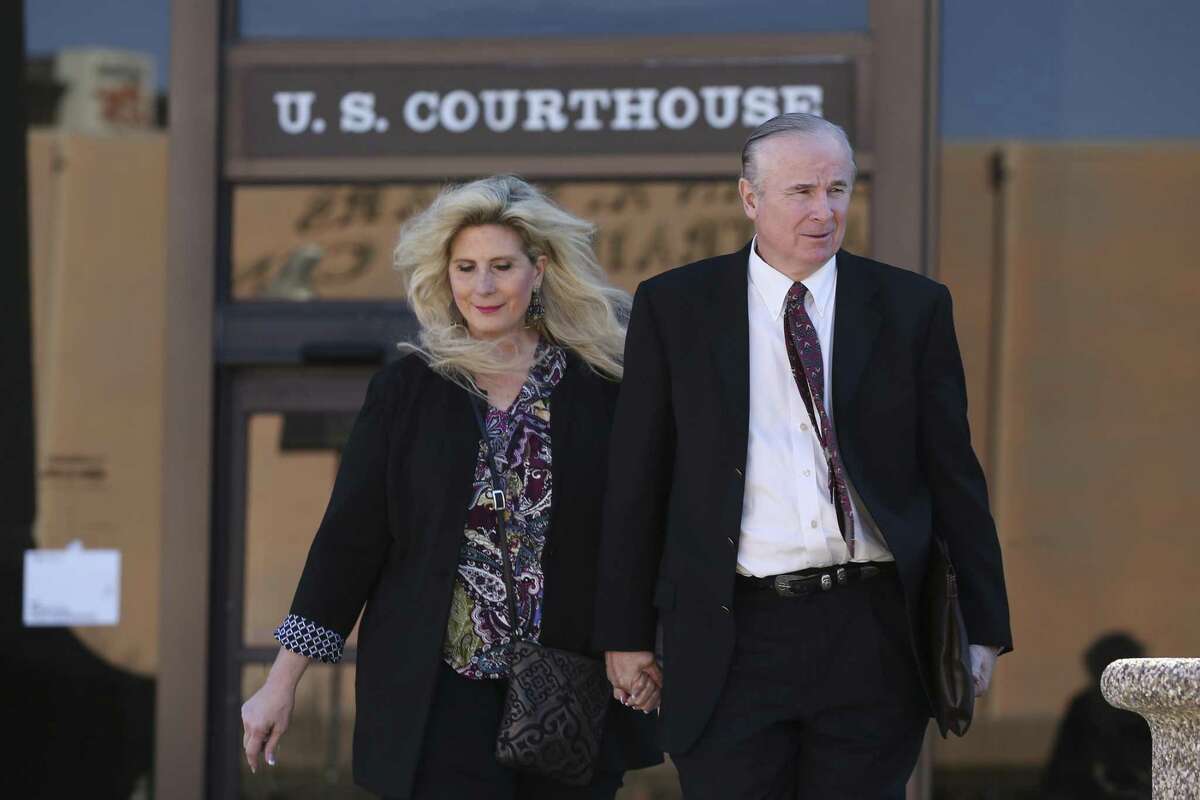 Prosecution witnesses Richard and Sharlene Thum leave the John H. Woods U.S. Federal Courthouse during a lunch break in the criminal fraud trial of Texas State Sen. Carlos Uresti and his co-defendant, Gary Cain, Monday, Jan. 29, 2018. The trial is in its second week and the Thum's were investors in the bankrupt FourWinds Logistic company that invested in fracking sand. The couple, owner of Four Star Cleaners, invested $1.4 million in the company and lost most of it.