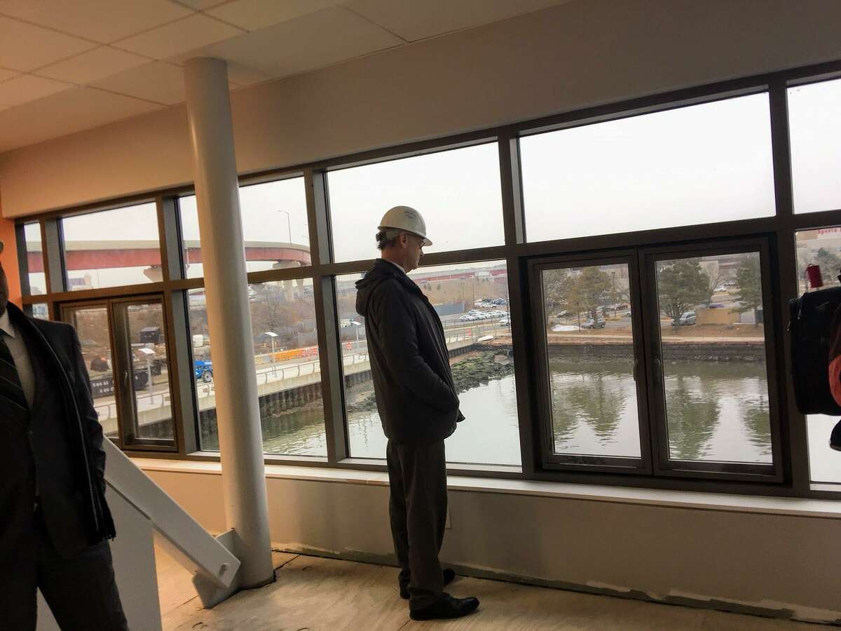 Economic Development Administrator Matthew Nemerson looks out from the main room on the second floor of Adee Boathouse.