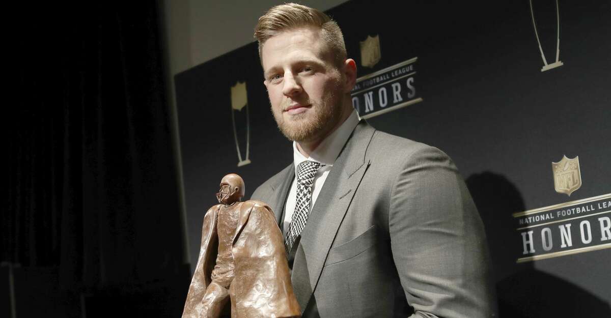 In this photo provided by the NFL, J. J. Watt poses in the press room with the Walter Payton NFL Man of the Year award at the 7th Annual NFL Honors at the Cyrus Northrop Memorial Auditorium on Saturday, Feb. 3, 2018, in Minneapolis. (Photo by Jeff Lewis/Invision for NFL/AP Images)