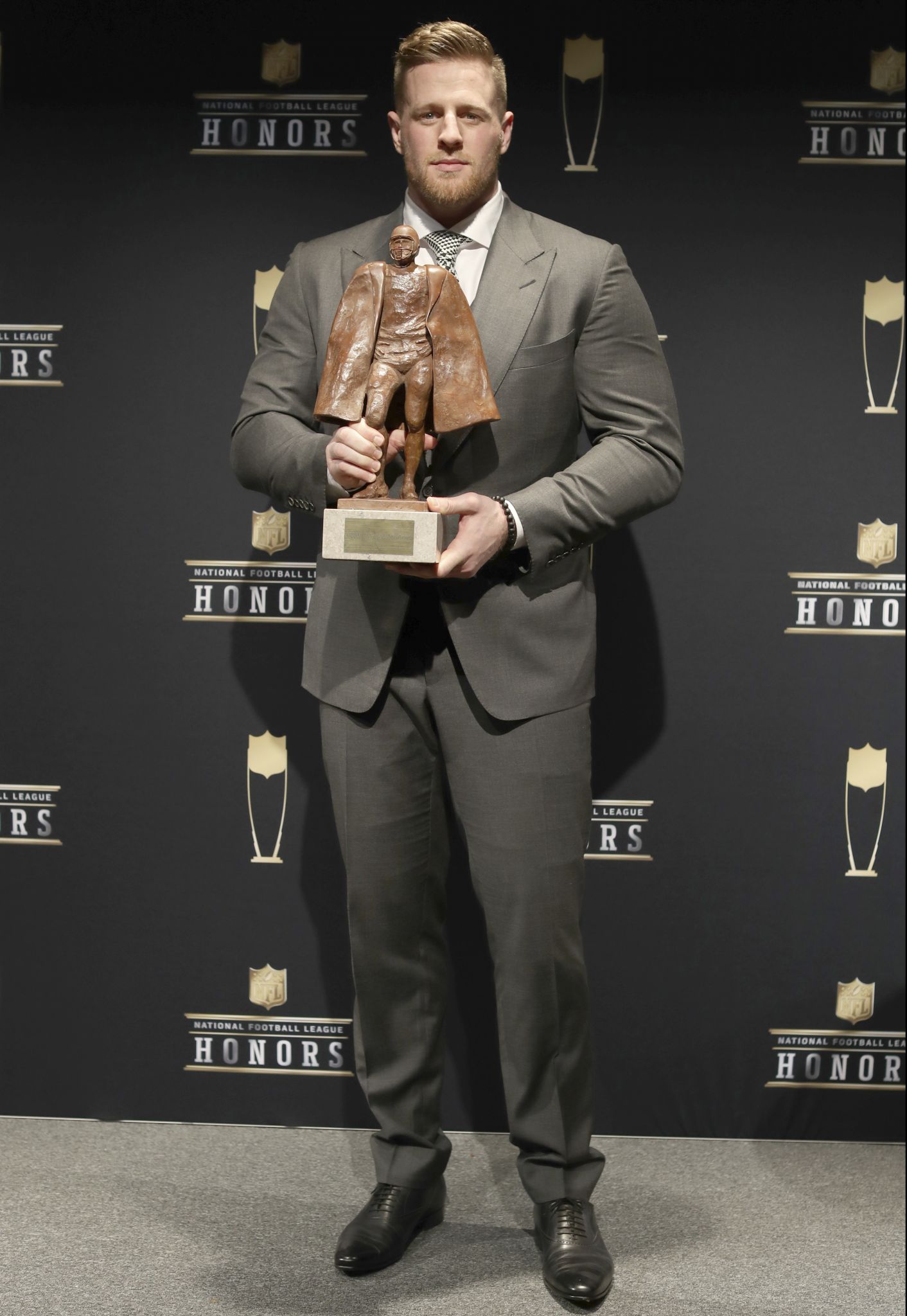 Paul Lukas on X: J.J. Watt won the Walter Payton Man of the Year