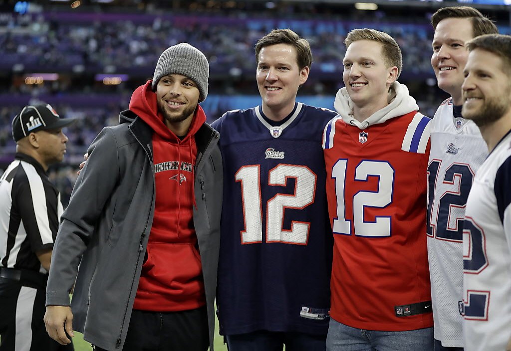 Bradley Cooper Hypes Up the Crowd at Football Game in Philadelphia