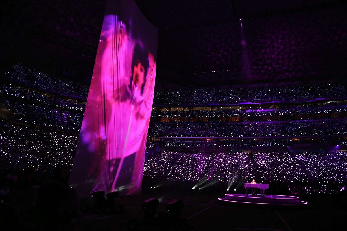 An image of the late US musician Prince is projected on a large screen as Justin Timberlake performs on stage during the Super Bowl LII halftime show at the US Bank Stadium in Minneapolis, Minnesota February 4, 2018. / AFP PHOTO / TIMOTHY A. CLARYTIMOTHY A. CLARY/AFP/Getty Images