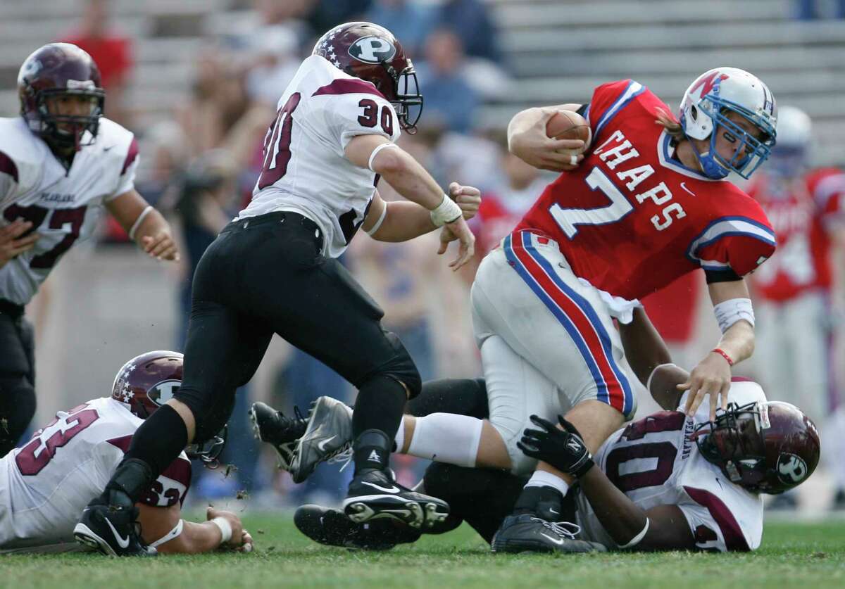  The Pearland defense bring down Westlake High School senior quarterback Nick Foles (7) in the first half of the Pearland High School vs. Westlake High School Class 5A Division I State Semifinals football game at Kyle Field on Saturday December 16, 2006 in College Station, Texas. Westlake High School won 35-32 to advance to the state championship game next weekend in San Antonio, Texas.