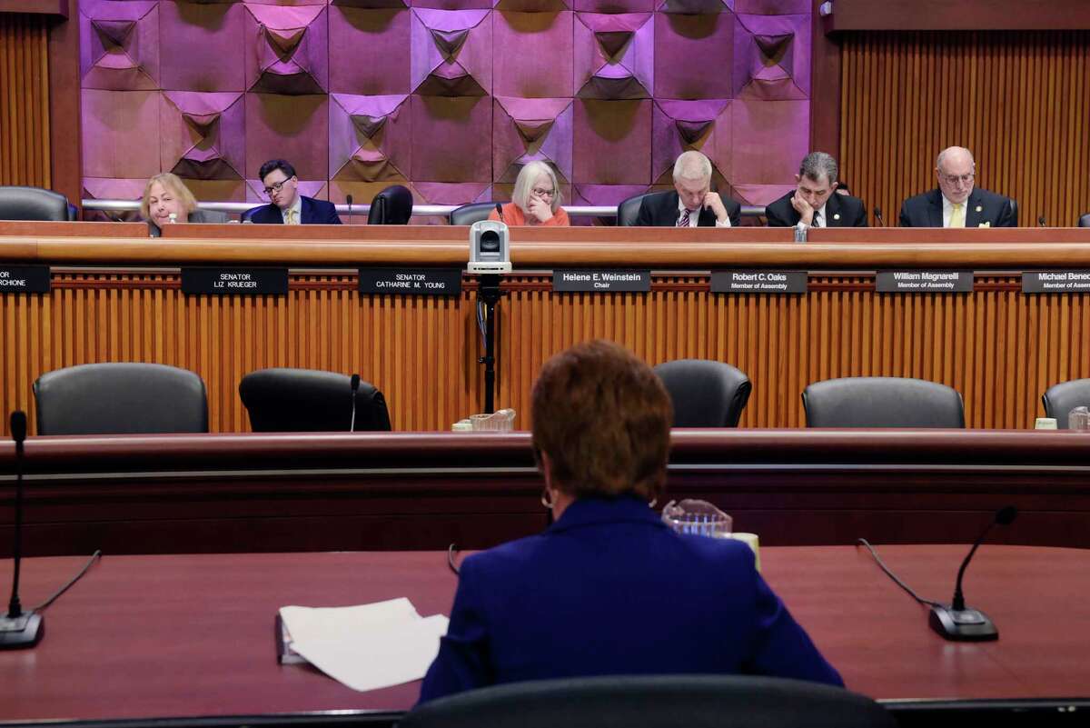 Legislators listen as Albany Mayor Kathy Sheehan testifies at a New York State Legislature joint budget hearing dealing with funding for cities on Monday, Feb. 5, 2018, in Albany, N.Y. (Paul Buckowski/Times Union)