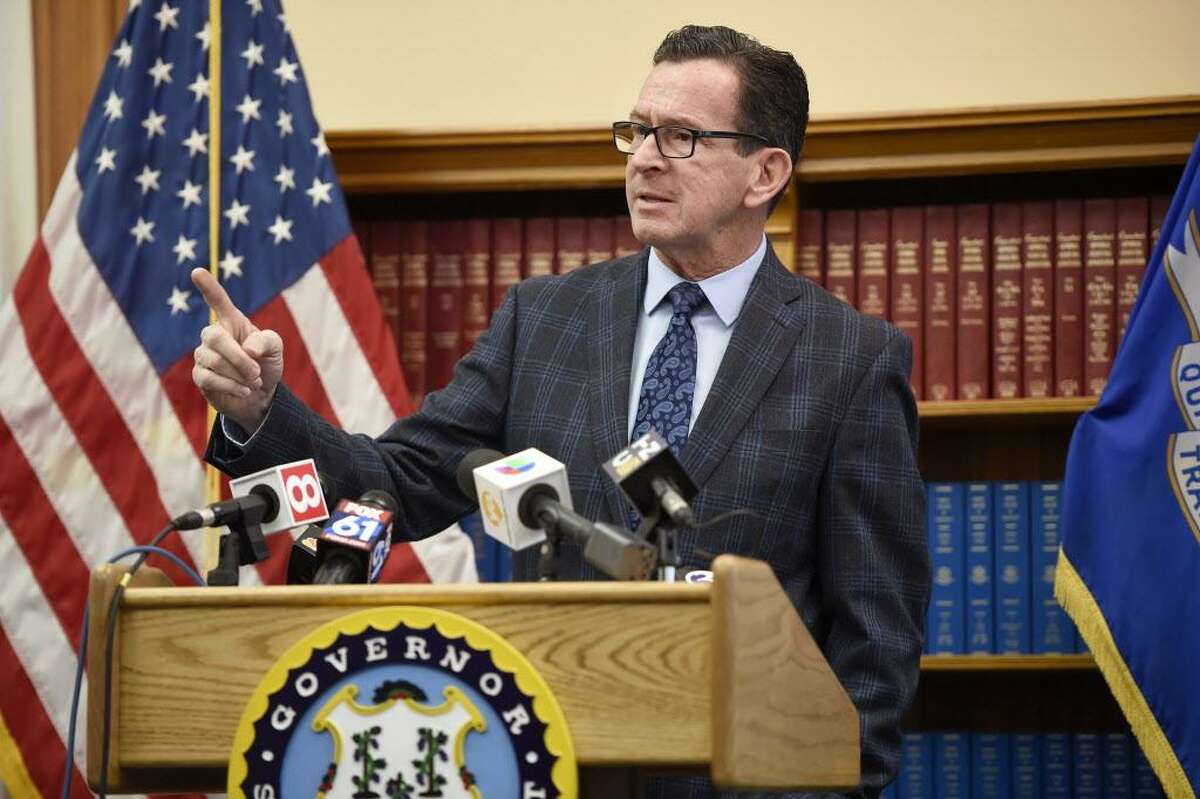 Gov. Dannel P. Malloy responds to a question during a news conference on Monday at the State Capitol in Hartford about the budget adjustments he is proposing for the 2019 fiscal year.