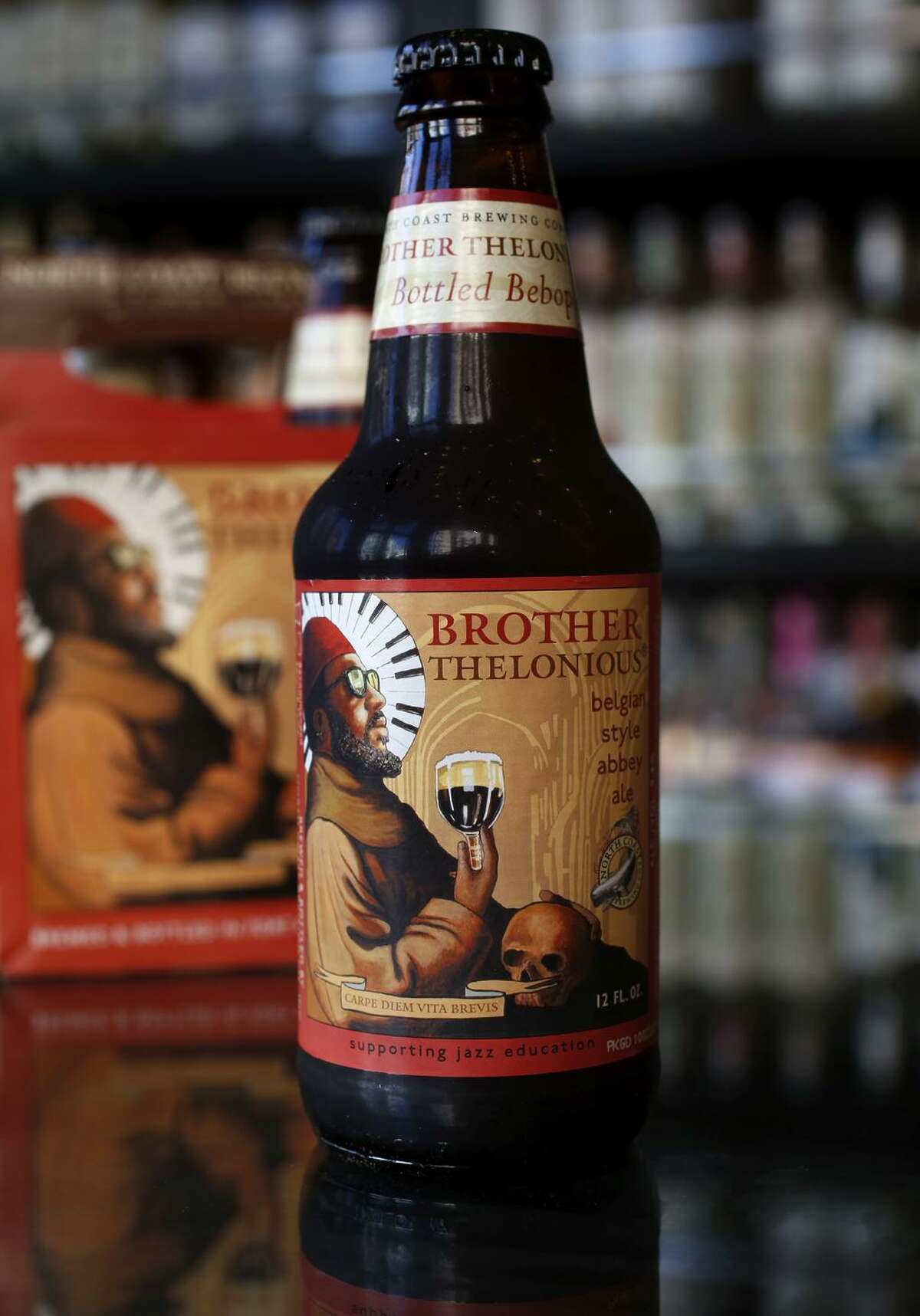 A bottle of “Brother Thelonious Belgian Style Abbey Ale,” with a label showing Thelonious Monk in his trademark cap and sunglasses.