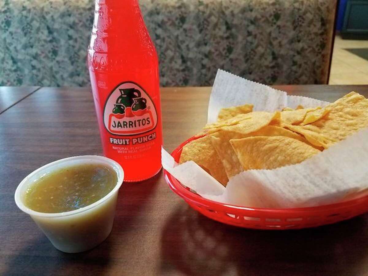 Chips, salsa Verde and a Jarritos Fruit Punch soda at Los Jalapenos Taqueria, located at 1900 S. Saginaw Road (in the Kmart plaza) in Midland. (Photo by Matthew Woods for the Daily News)