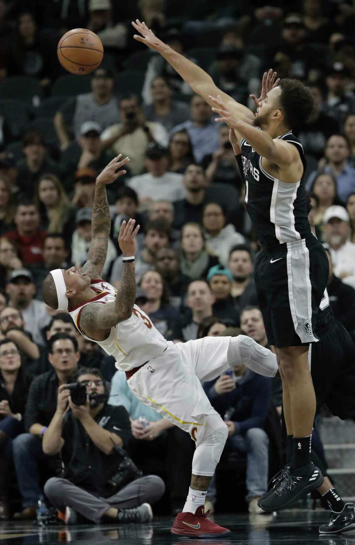 Cleveland Cavaliers guard Isaiah Thomas (3) shoots over San Antonio Spurs forward Kyle Anderson (1) during the second half of an NBA basketball game, Tuesday, Jan. 23, 2018, in San Antonio. San Antonio won 114-102.