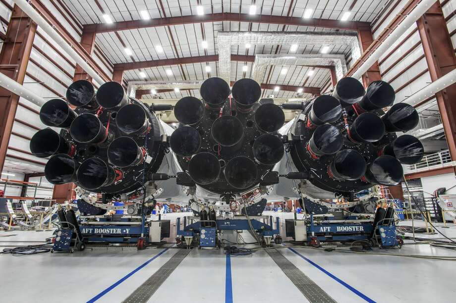 a photo provided by spacex of the falcon heavy, a beefed-up