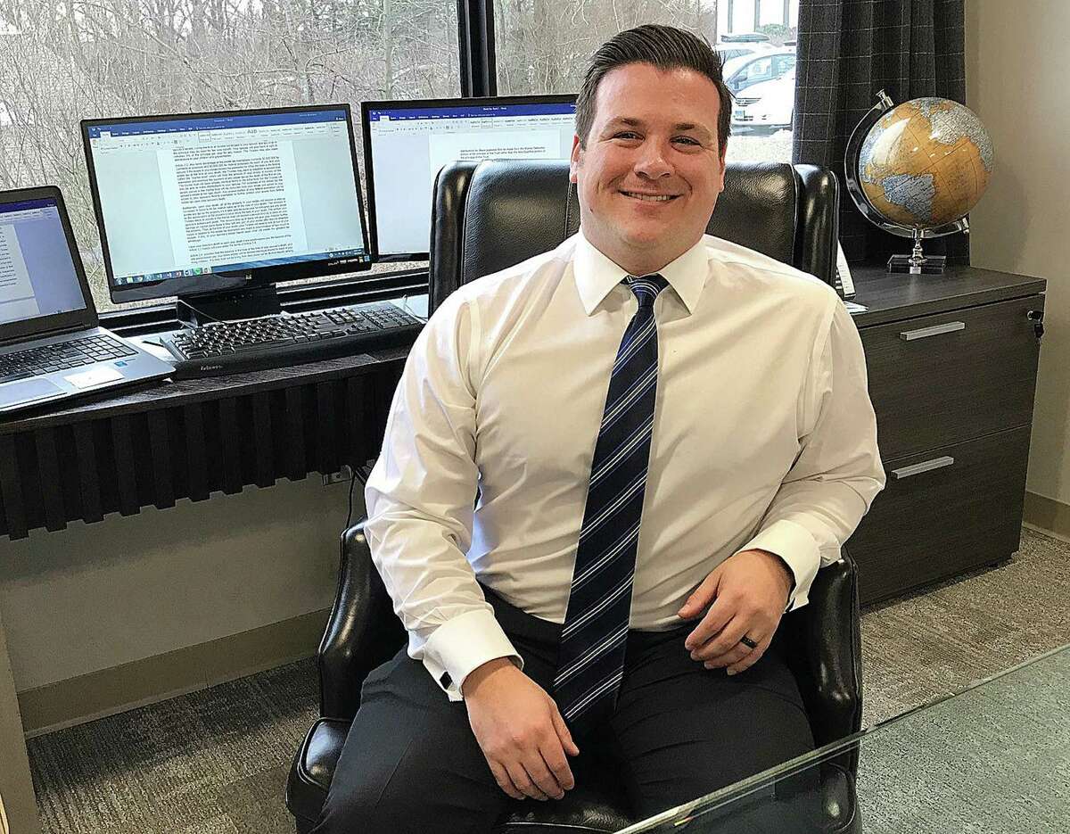 Joshua Weinshank of the law firm Cramer & Anderson sits in the firm's new office in Ridgefield, Conn., on Tuesday, Feb 6, 2018.