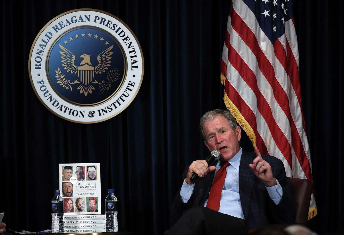 Former President George W. Bush discusses his book “Portraits of Courage: A Commander in Chief's Tribute to America's Warriors” at the Ronald Reagan Presidential Library last year. An exhibit of paintings featured in the book is coming to the Witte Museum.
