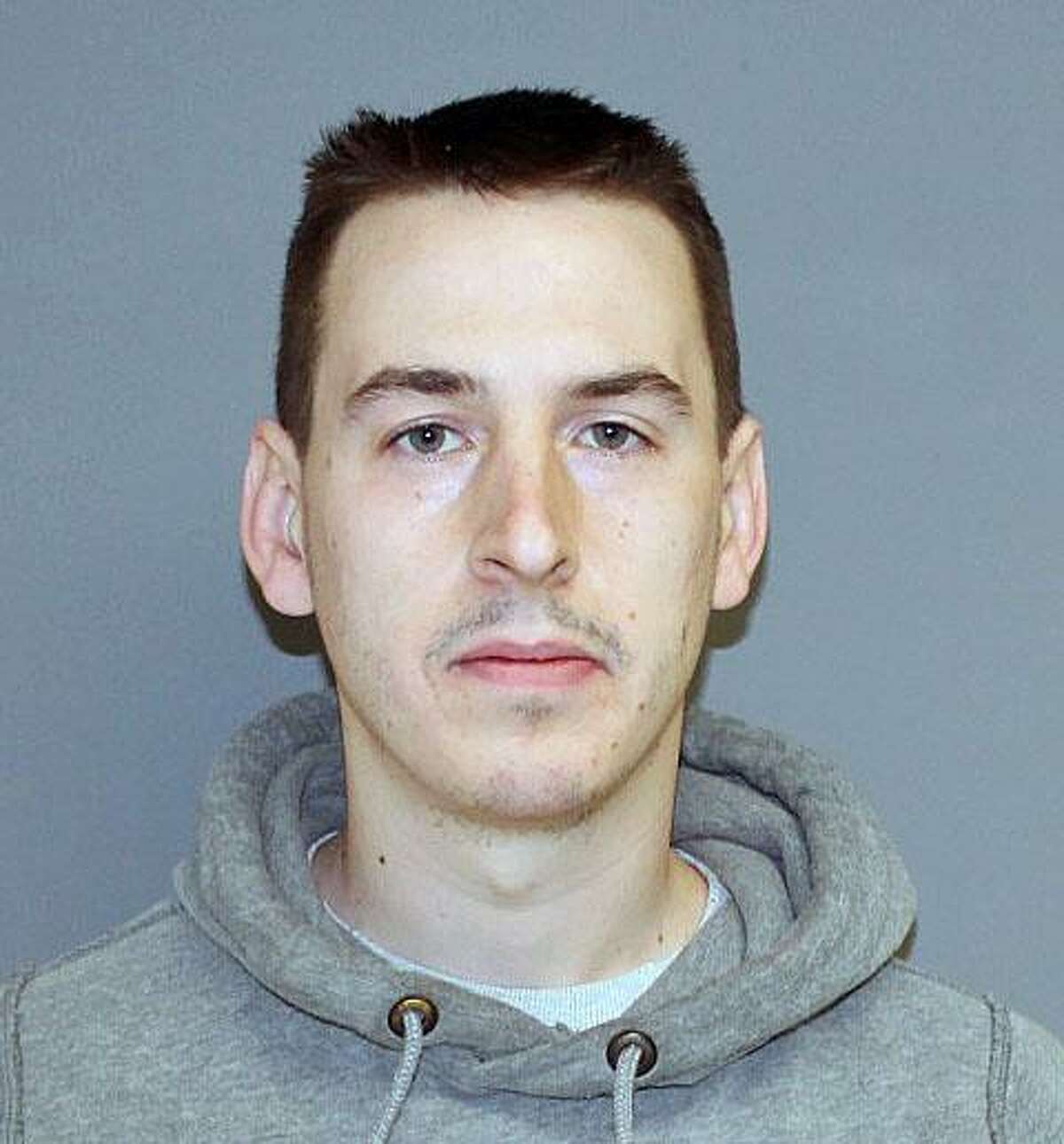 Tyler Johnson, 28, of Shelton, Conn., was charged with third-degree burglary by Fairfield Police.