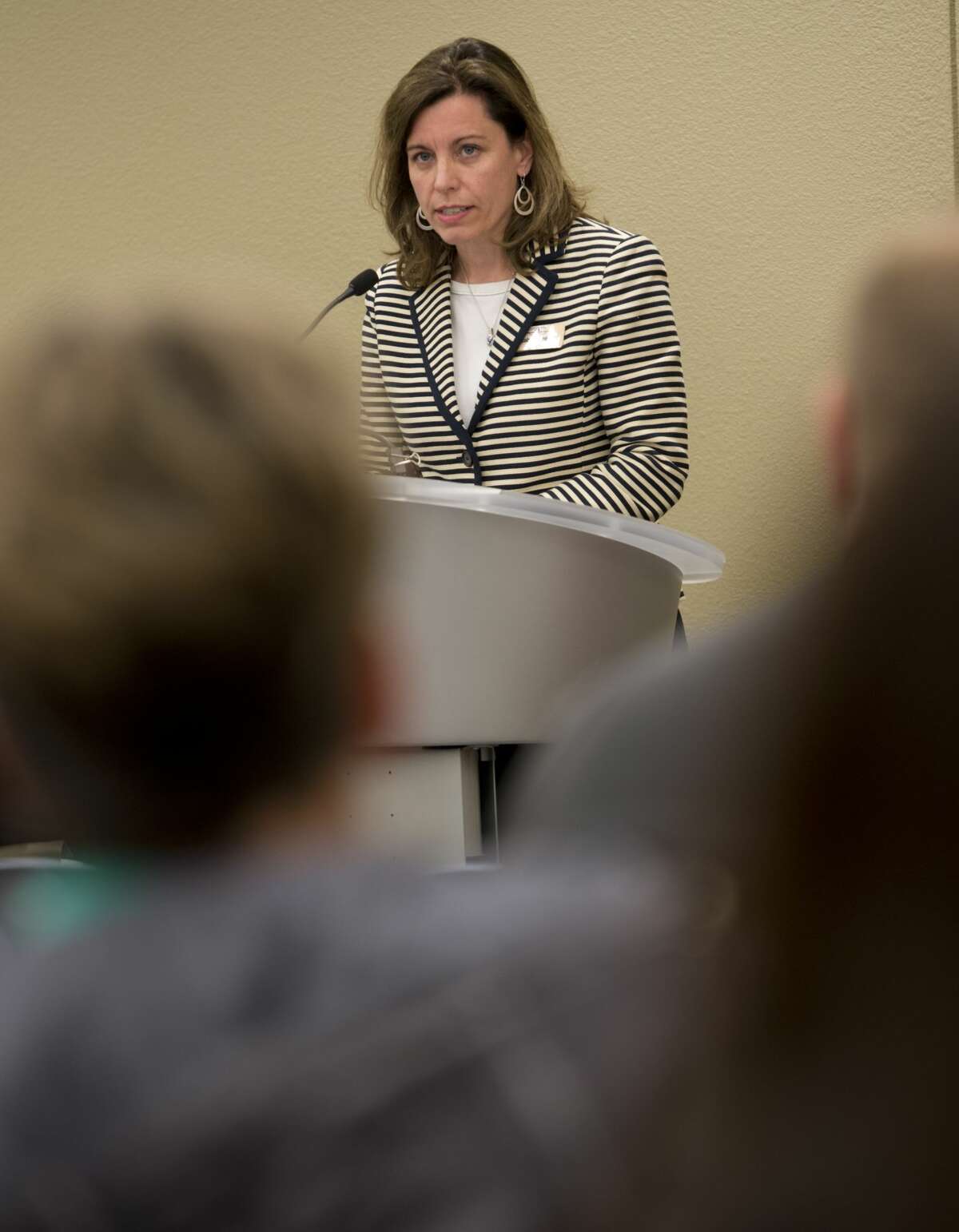 Candidtate for re-election to the 238th District Court Elizabeth Leonard answers questions 02/06/18 evening during a candidate forum at the Centennial Library. Tim Fischer/Reporter-Telegram