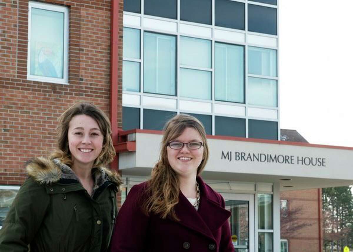 Saginaw Valley State University residential students Hannah Waslusky, left, and Lindsey Briolat stand outside M.J. Brandimore House, a campus residence hall. SVSU's residential facilities are ranked No. 2 in the U.S. among the 512 public universities included in the annual 'Best Dorms' rankings by the website Niche; overall, SVSU is ranked No. 18 nationally. (Photo provided)